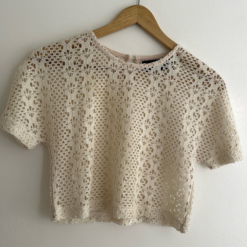 Crochet cream crop top. Size XXS, I’m usually a XS/S and this fits perfect